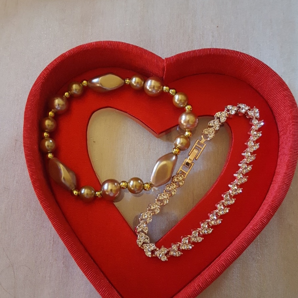 Two pretty bracelets,  one stretch